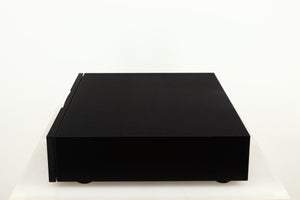 Right side view of a used Naim CD555PS DR Power Supply in a black finish