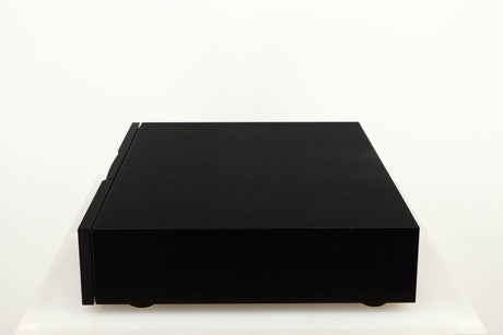 Right side view of a used Naim CD555PS DR Power Supply in a black finish