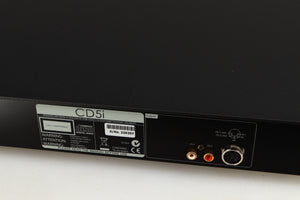 Close up of a used Naim CD5i CD Player in a black finish showing scratches on top near rear