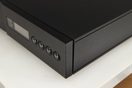 Front right corner of a used Naim CD5i CD Player in a black finish