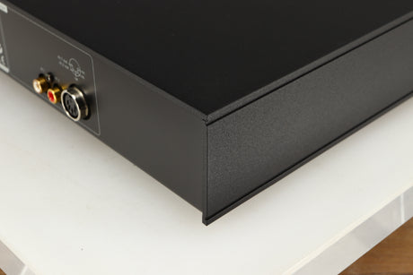 Rear left corner of a used Naim CD5i CD Player in a black finish