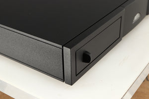 Front left corner of a used Naim CD5si CD Player in a black finish