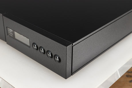 Front right corner of a used Naim CD5X CD Player in a black finish