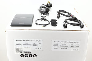 Box of a used Naim Classic NAP250 Power Amplifier showing Mains Cable, Manual, Speaker Plugs, Optical Cable, 2x XLR Cables