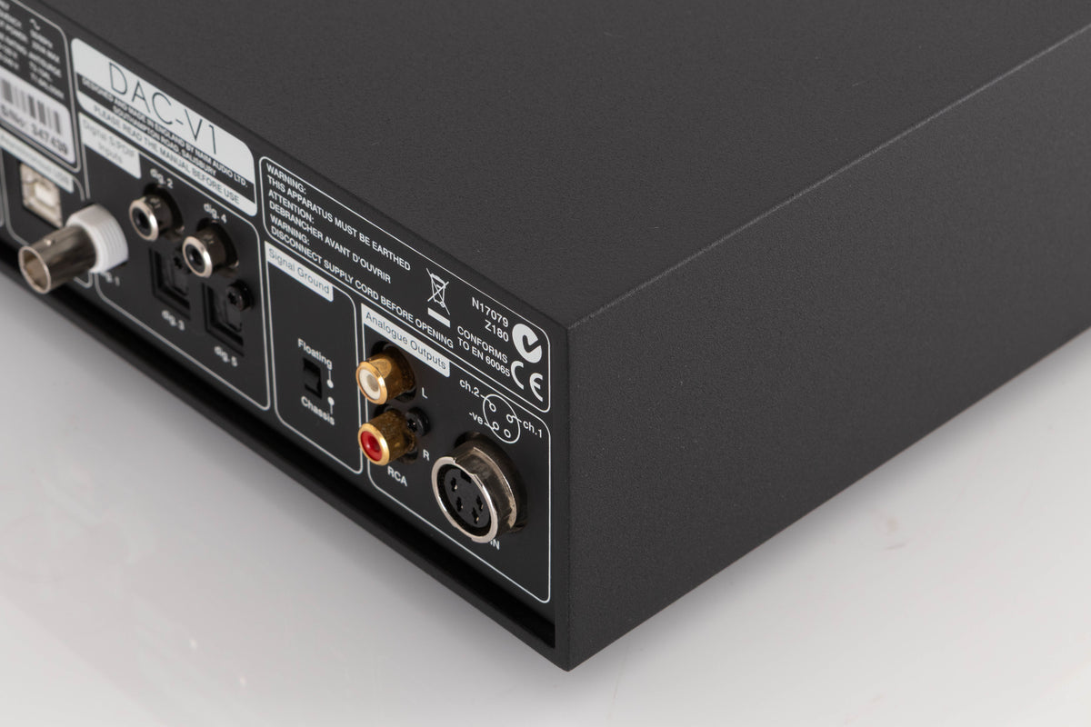 Rear left corner of a used Naim DAC V-1 Digital Analogue Converter in a Black finish