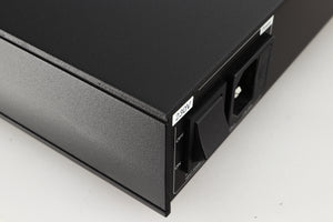 Close up of a used Naim Flatcap 2X Power Supply in a black finish showing some scratching on right side 