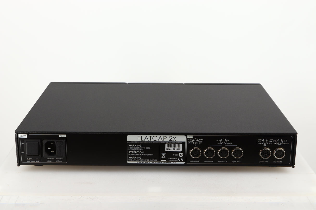 Rear view of a used Naim Flatcap 2X Power Supply in a black finish showing Mains Input and DIN Outputs