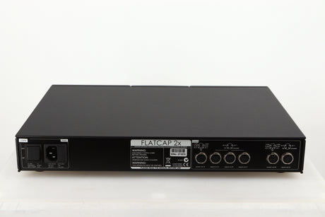 Rear view of a used Naim Flatcap 2X Power Supply in a black finish showing Mains Input and DIN Outputs