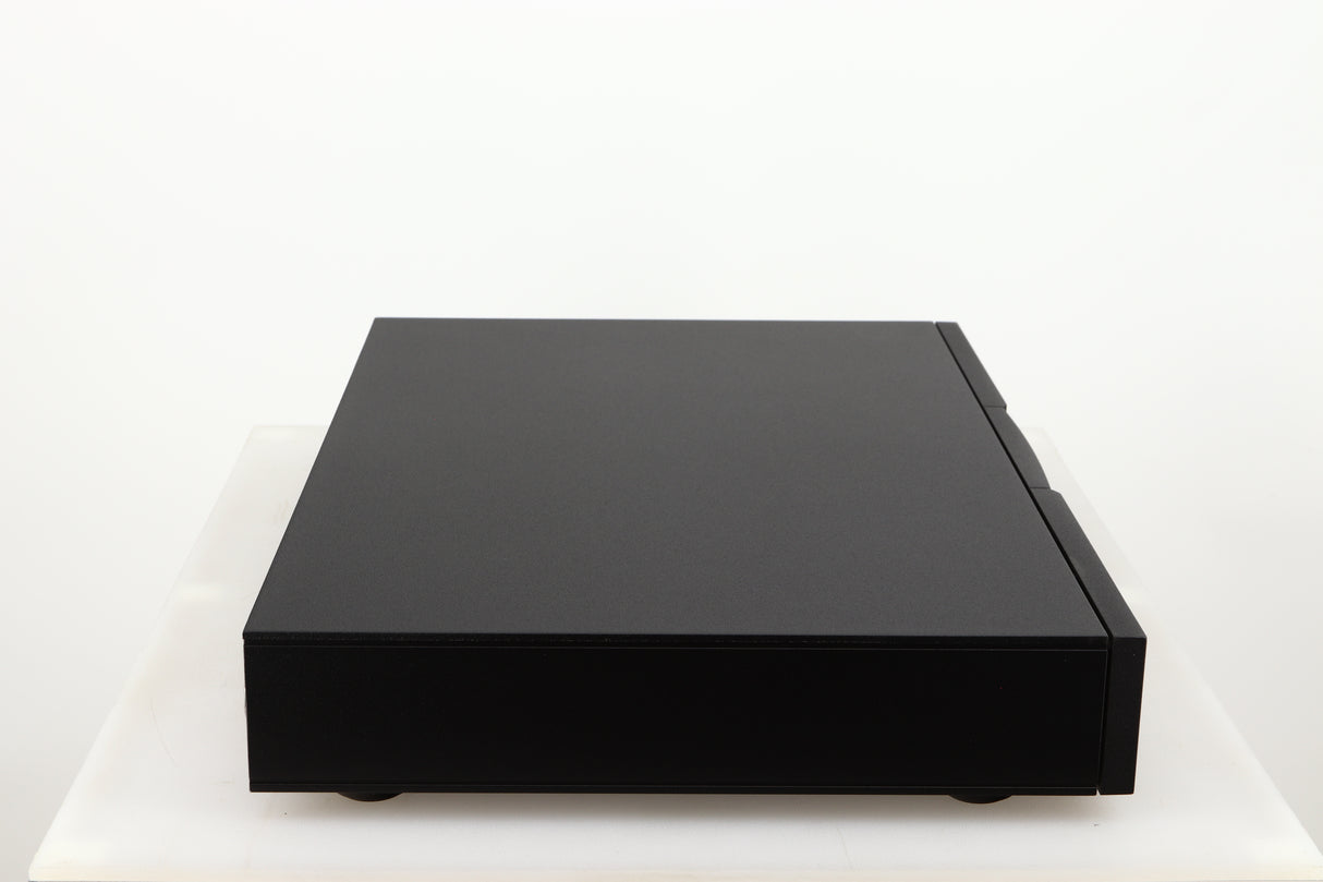 Left side view of a used Naim Flatcap 2X Power Supply in a black finish
