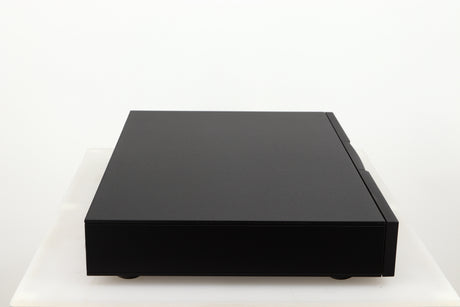 Left side view of a used Naim Flatcap 2X Power Supply in a black finish