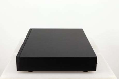 Right side view of a used Naim Flatcap 2X Power Supply in a black finish