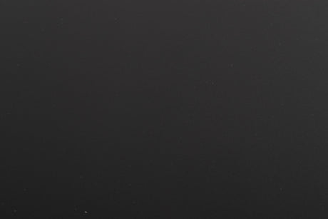 Close up of a used Naim Flatcap Power Supply in a Black finish showing scratch on top