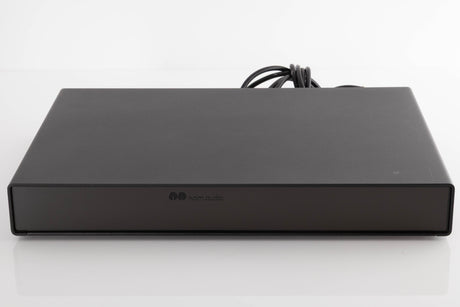 Front view of a used Naim Flatcap Power Supply in a Black finish