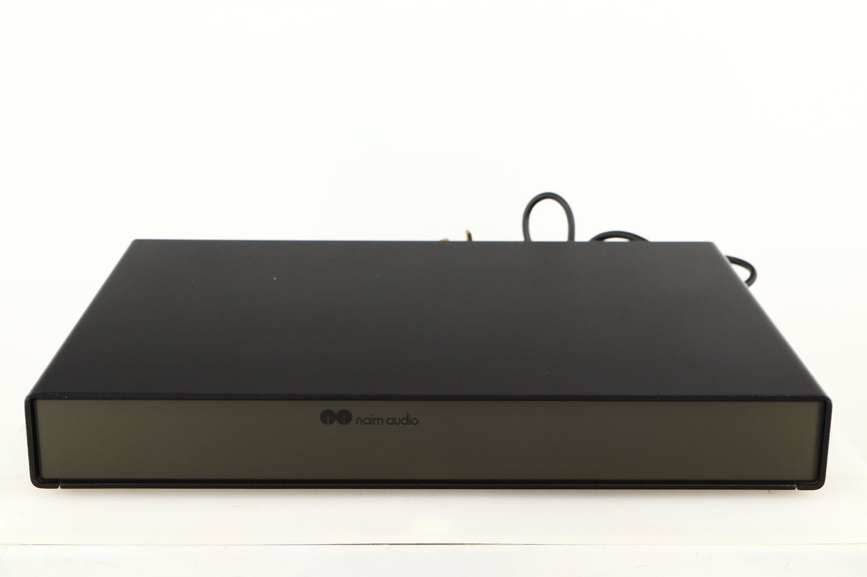 Front view of a used Naim Flatcap Power Supply in a black finish