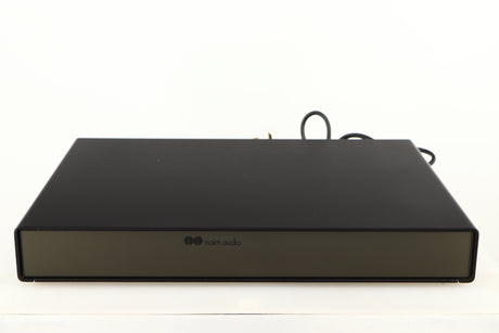 Front view of a used Naim Flatcap Power Supply in a black finish