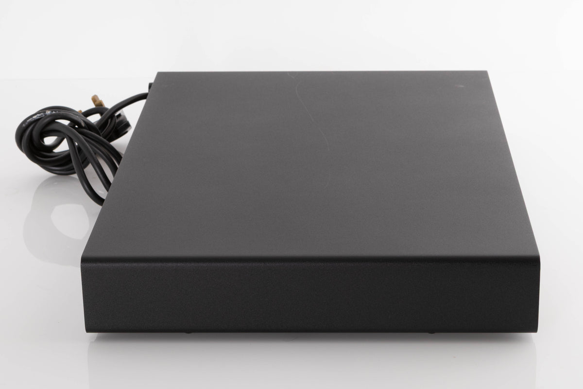 Left side view of a used Naim Flatcap Power Supply in a Black finish