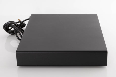 Left side view of a used Naim Flatcap Power Supply in a Black finish