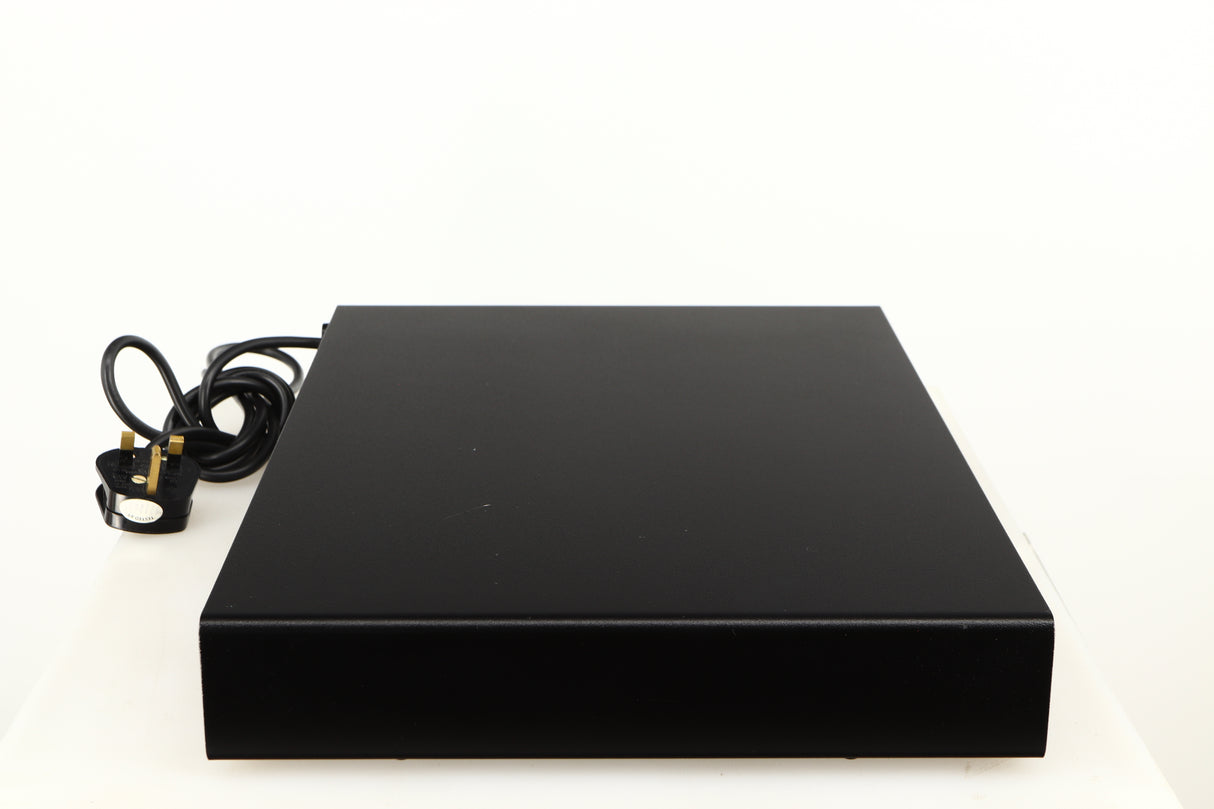 Left side view of a used Naim Flatcap Power Supply in a black finish