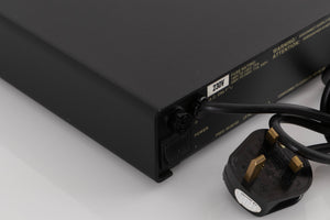 Rear right corner of a used Naim Flatcap Power Supply in a Black finish
