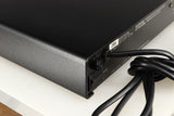 Rear right corner of a used Naim Flatcap Power Supply in a black finish