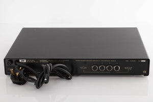 Rear view of a used Naim Flatcap Power Supply in a Black finish showing DIN Inputs