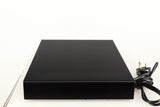 Right side view of a used Naim Flatcap Power Supply in a black finish