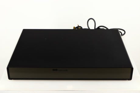 Top of a used Naim Flatcap Power Supply in a black finish