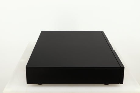 Left side view of a used Naim Flatcap XS Power Supply in a black finish