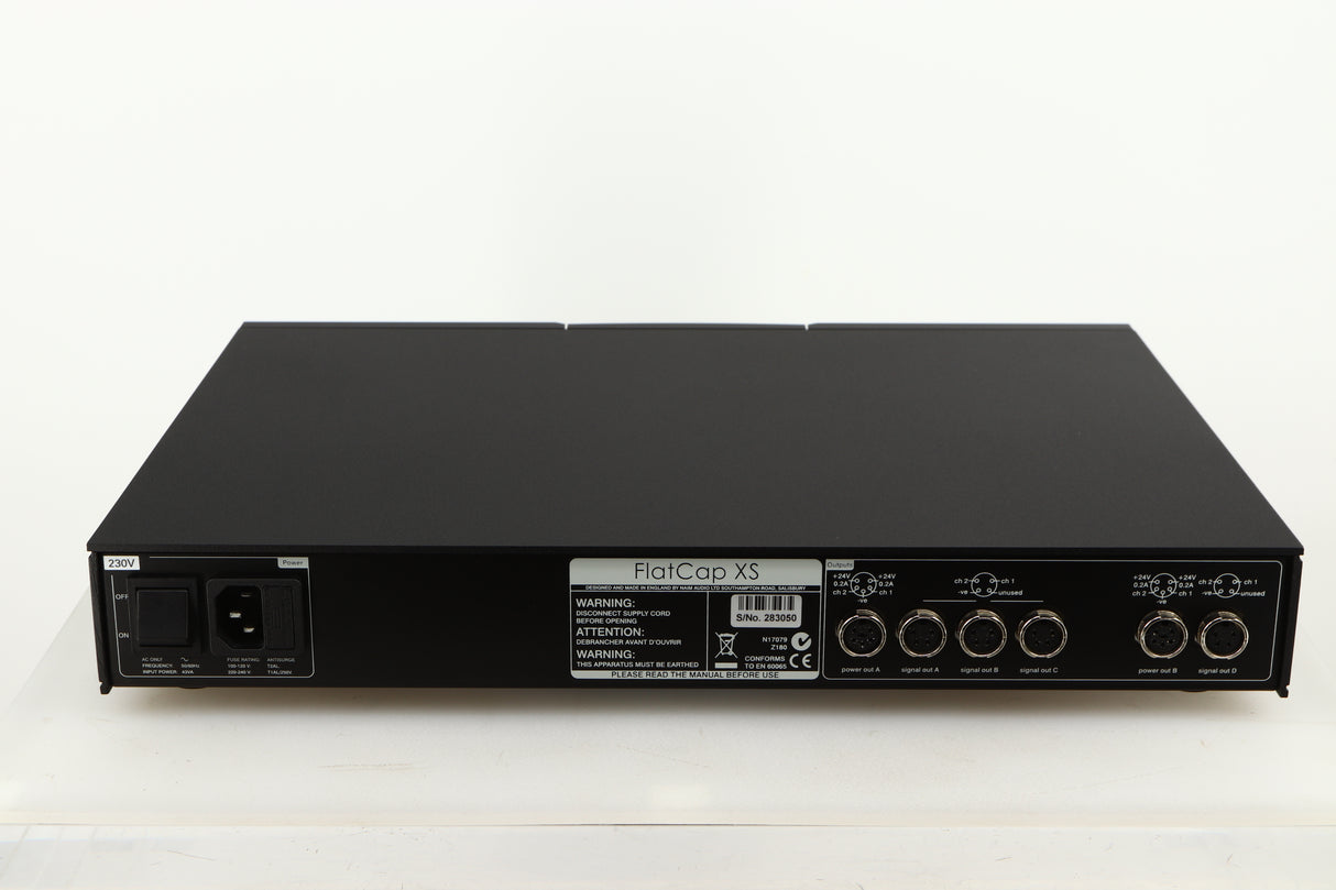 Rear view of a used Naim Flatcap XS Power Supply in a black finish showing Mains Input and DIN Outputs