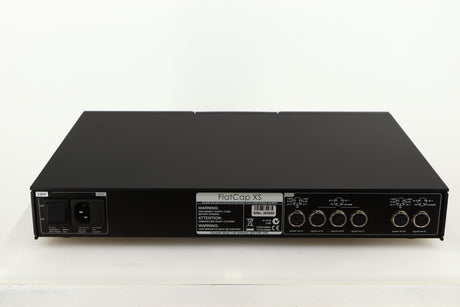 Rear view of a used Naim Flatcap XS Power Supply in a black finish showing Mains Input and DIN Outputs