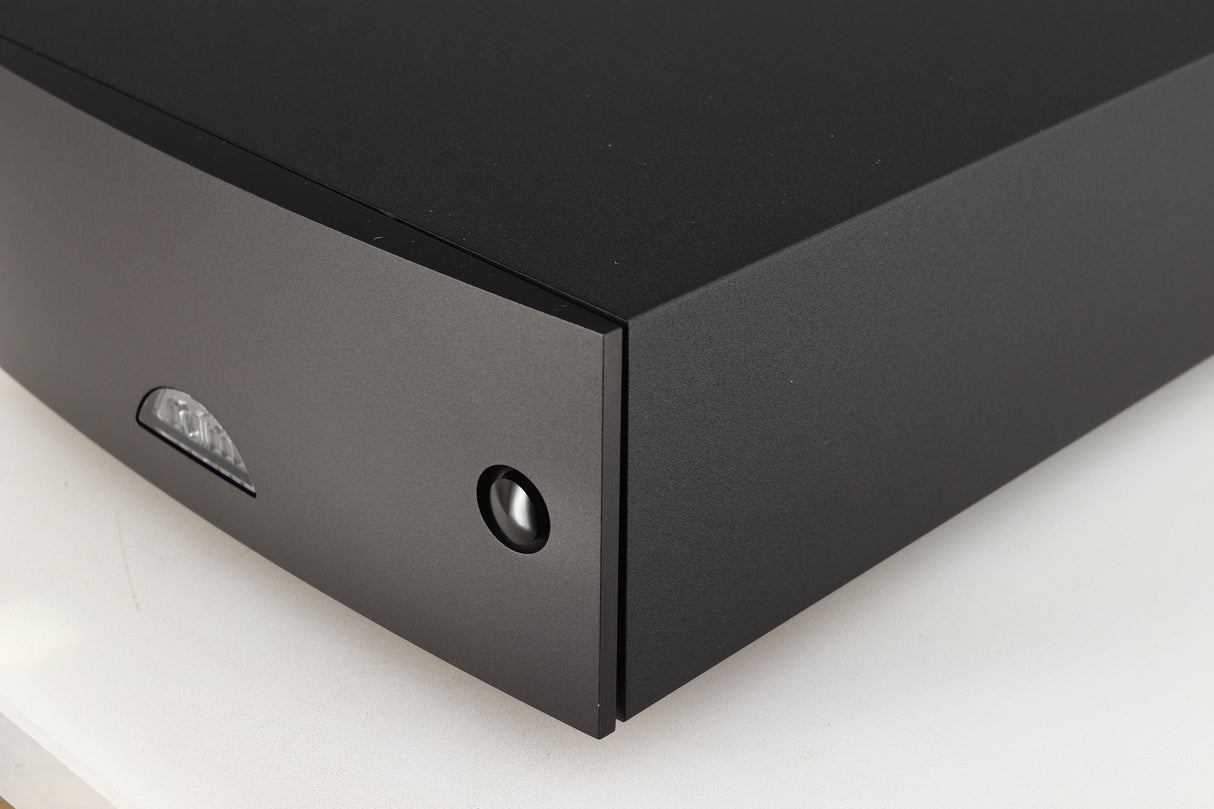 Front right corner of a used Naim Hicap DR Power Supply in a black finish
