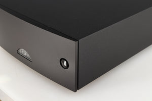 Front right corner of a used Naim Hicap DR Power Supply in a black finish