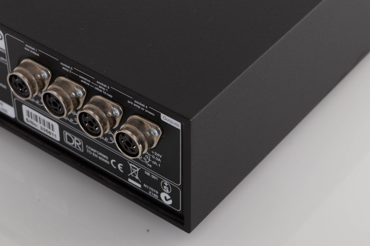 Rear left corner of a used Naim Hicap DR Power Supply in a Black finish