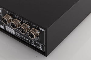 Rear left corner of a used Naim Hicap DR Power Supply in a Black finish