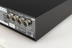 Rear left corner of a used Naim Hicap DR Power Supply in a black finish