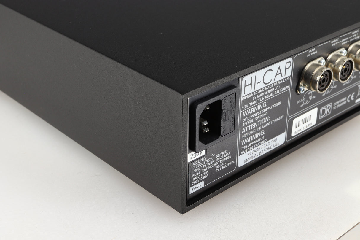 Rear right corner of a used Naim Hicap DR Power Supply in a black finish