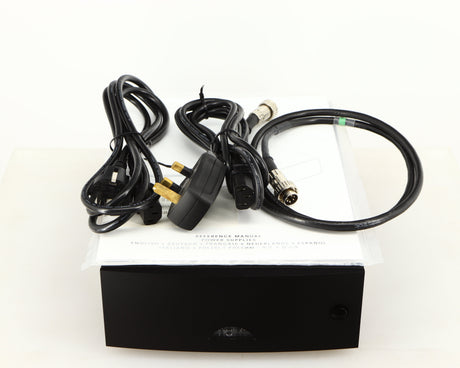 Top of a used Naim Hicap DR Power Supply in a black finish showing Manual, SNAIC5, Mains Cable and Schuko Cable