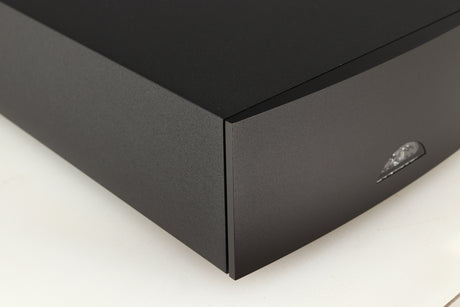 Front left corner of a used Naim Hicap DR Power Supply in a black finish