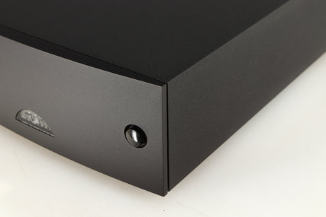 Front right corner of a used Naim Hicap DR Power Supply in a black finish