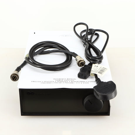 Top of a used Naim Hicap Power Supply in a black finish showing Mains Cable, SNAIC5 and Manual