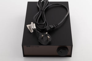 Top of a used Naim Hicap Power Supply in a Black finish showing Mains Cable