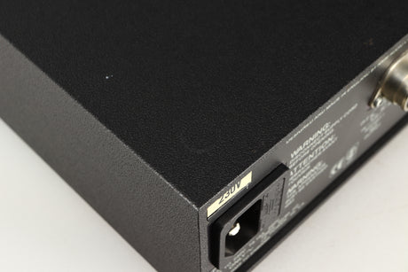 Close up of a used Naim Hicap Power Supply in a black finish showing mark on top