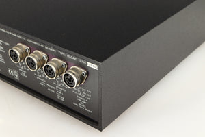 Rear left corner of a used Naim Hicap Power Supply in a black finish
