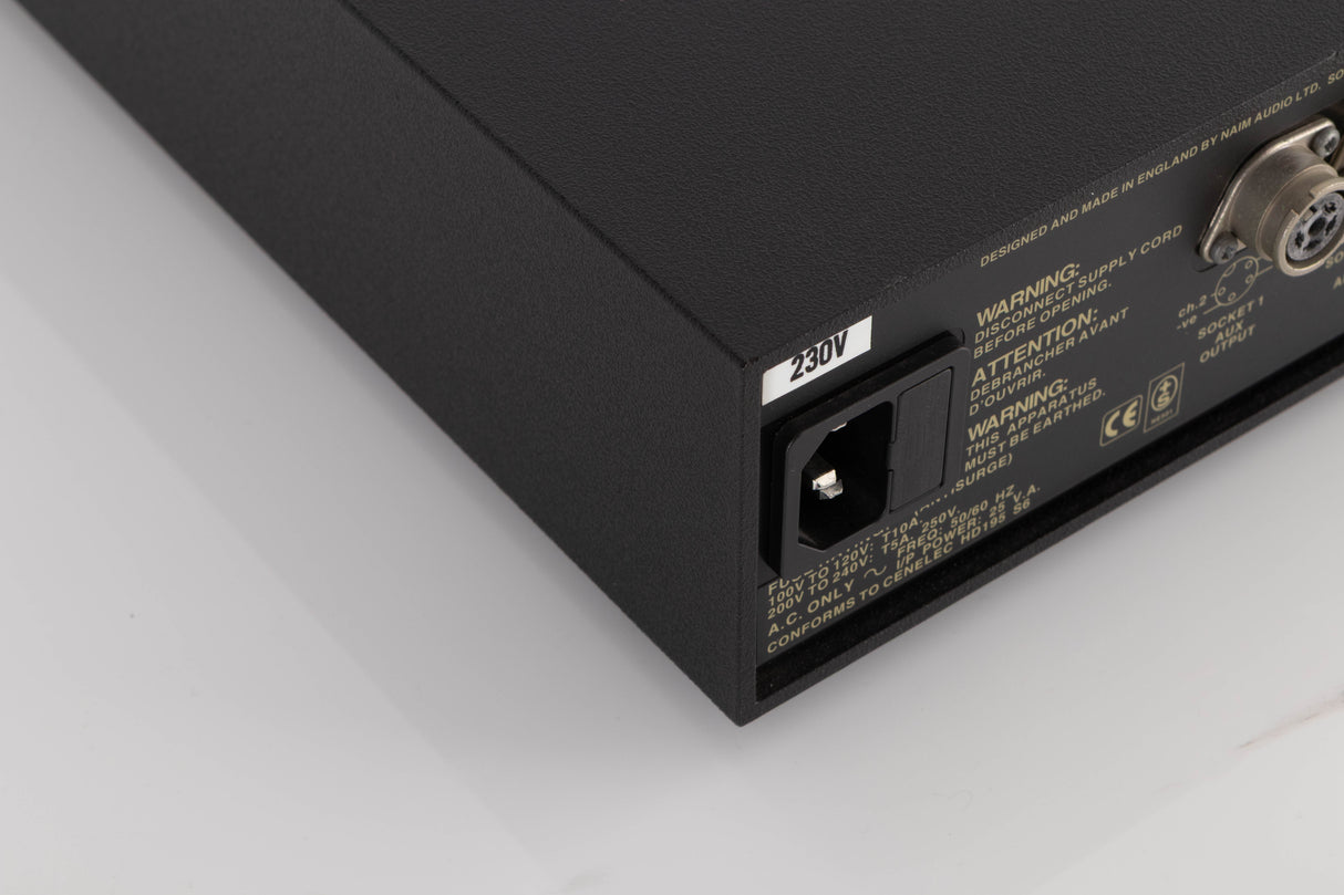 Rear right corner of a used Naim Hicap Power Supply in a Black finish