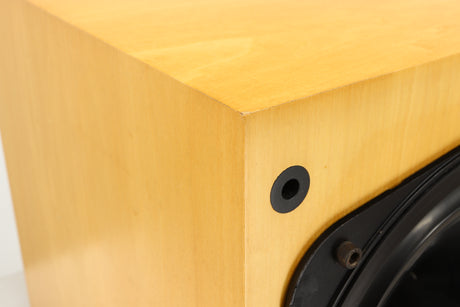 Close up view of a used Naim Intro Head Unit with Driver in Maple finish