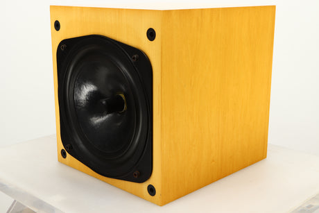 Front right corner view of a used Naim Intro Head Unit with Driver in Maple finish