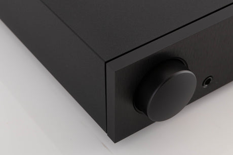 Front left corner of a used Naim NAC N-272 Pre Amplifier in a Black finish