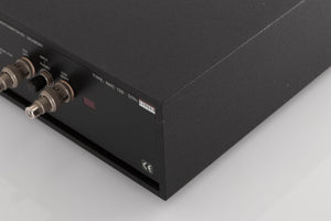 Rear left corner of a used Naim NAC102 W/ NAPSC in a Black finish