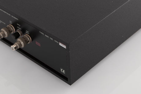 Rear left corner of a used Naim NAC102 W/ NAPSC in a Black finish