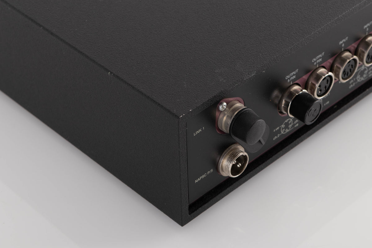 Rear right corner of a used Naim NAC102 W/ NAPSC in a Black finish